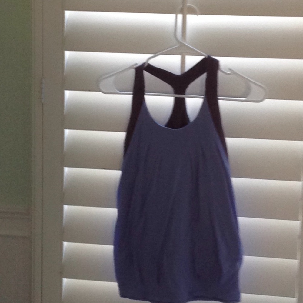 This is a purple Ivivva top
